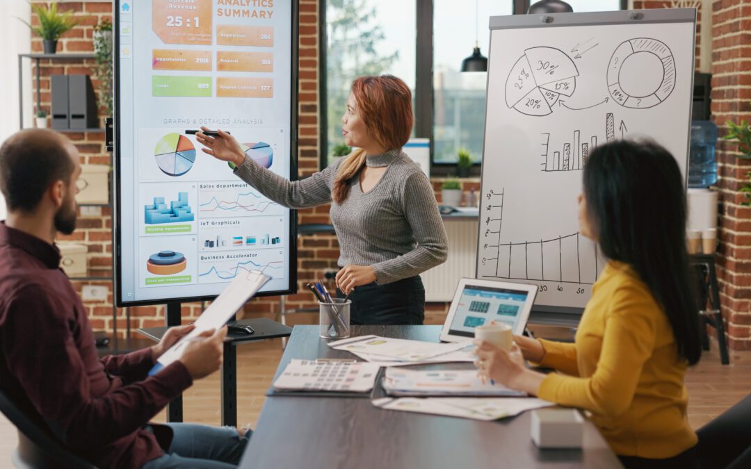 Business people looking at briefing presentation on display, analyzing charts information and statistics to plan financial growth and development. Colleagues brainstorming strategy ideas